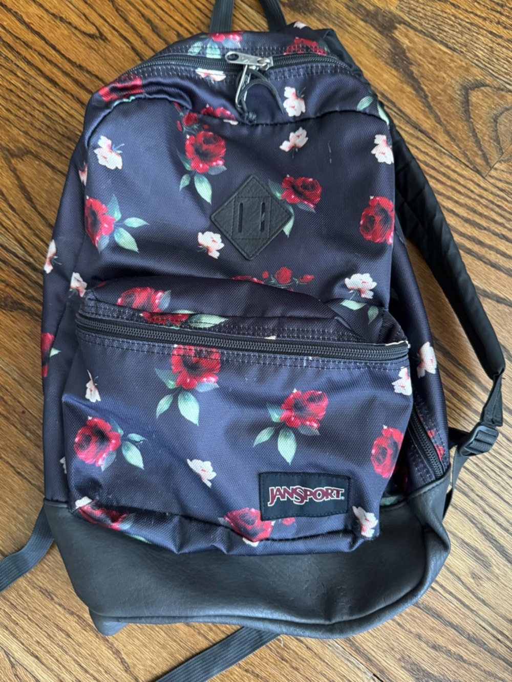 Jansport Black Backpack with Red Rose Print